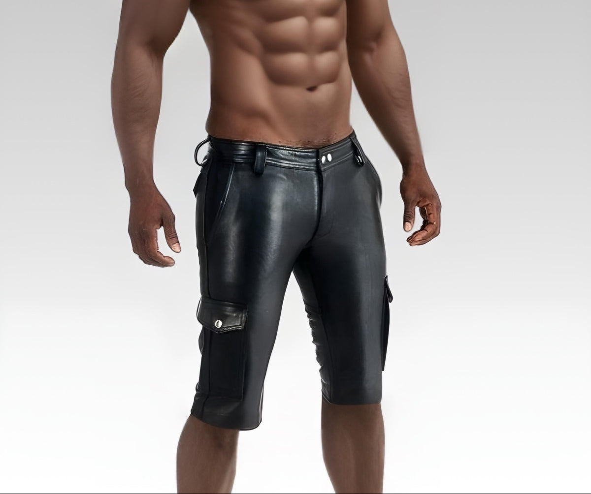 Black leather cargo shorts shown from the front with a side utility pocket