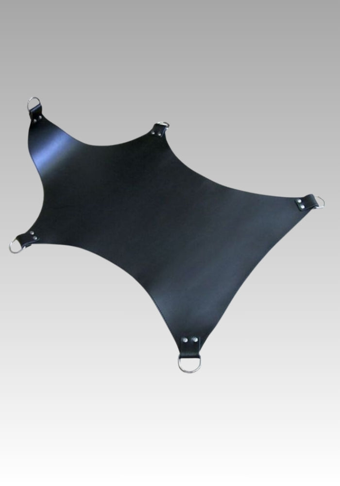Basic black leather sling bed laid flat with corner attachment straps and metal rings