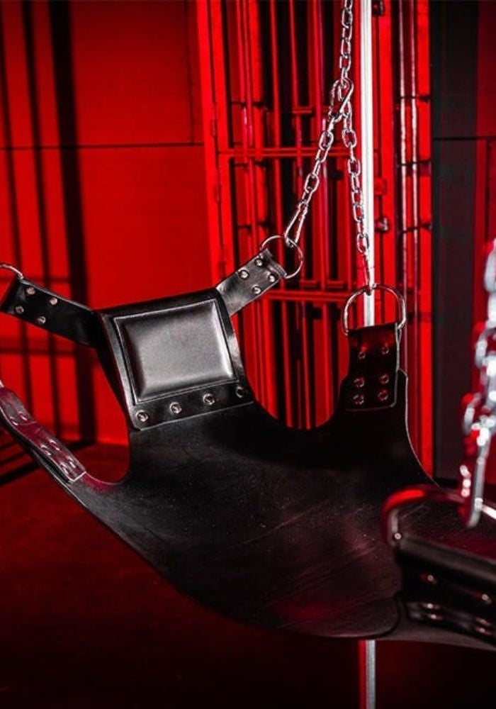 Close view of the Five Point sling bed, pillow and attachment straps in a frame setup