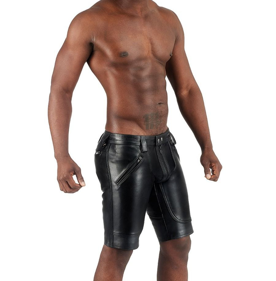 Man wearing black leather shorts for sale