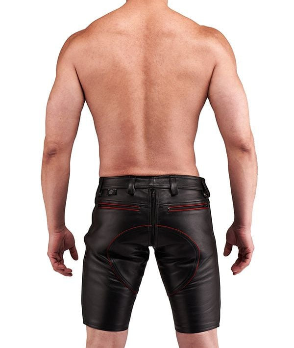 Man wearing black leather shorts with red stitching for sale