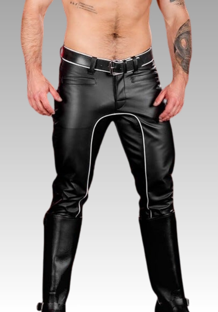 Black leather pants with white piping worn by a person on a gray background