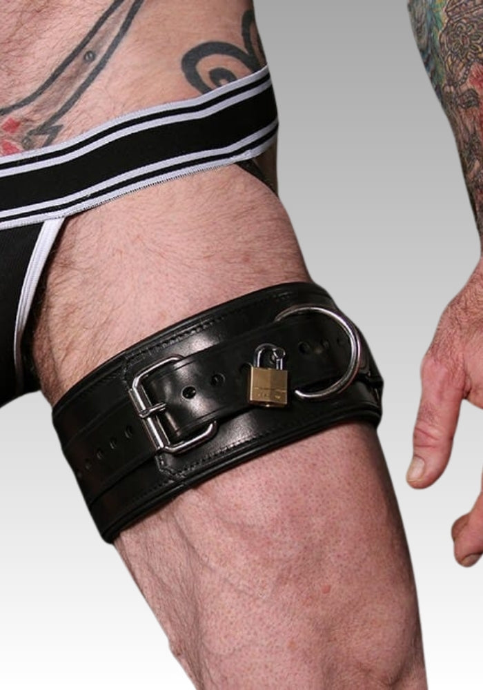 Black leather belt with a padlock on a person's leg for sale