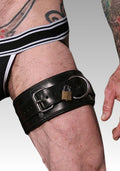 Black leather belt with a padlock on a person's leg for sale