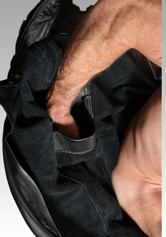 Interior opening and lining detail of the black leather sleepsack
