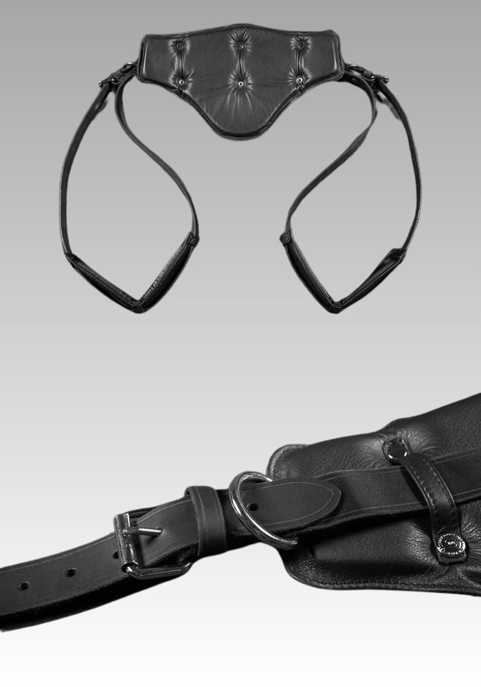 Portable leather sling viewed from the reverse with an inset buckle and padded support detail