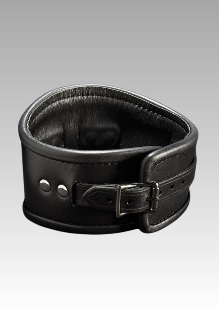 Wide black leather posture collar with padded interior and front buckle