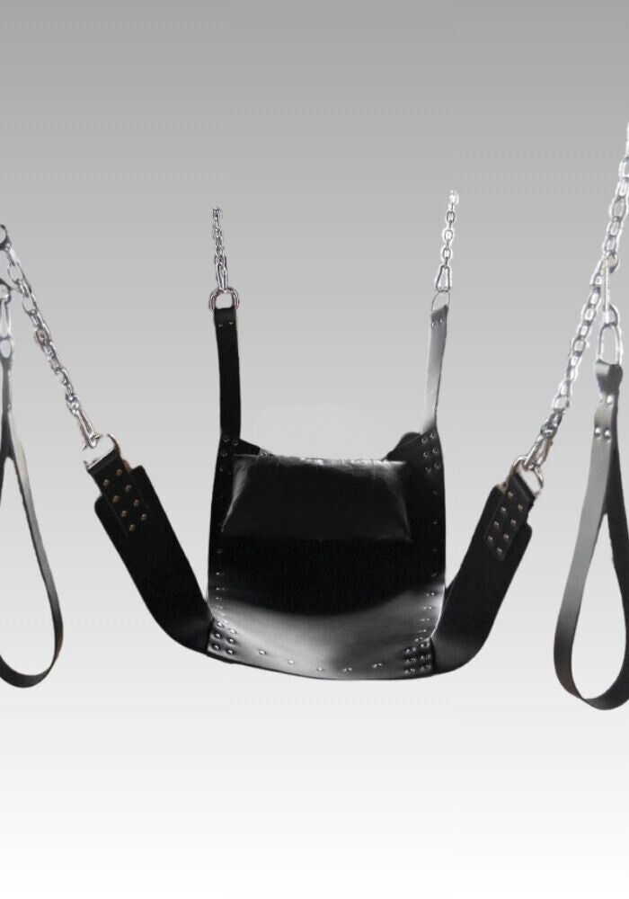 Deluxe Solid Leather Sex Sling with pillow and raised attachment straps, shown suspended